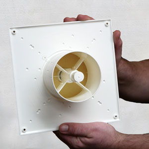 Photo of caulk placed around pop-out insulated ventilator