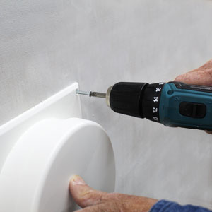 Place screws in pop-out ventilator's cover plate